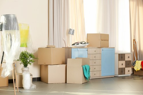 Removal team preparing a move in West Kensington street