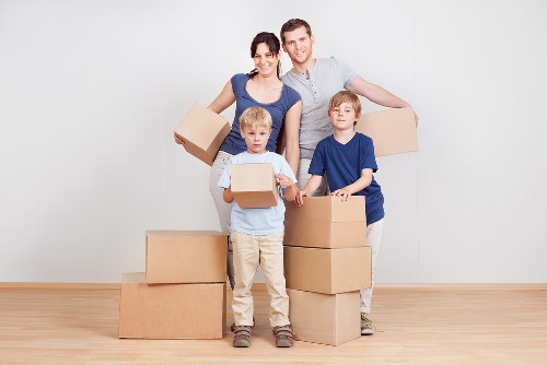 Packed household boxes ready for a house move in West Kensington