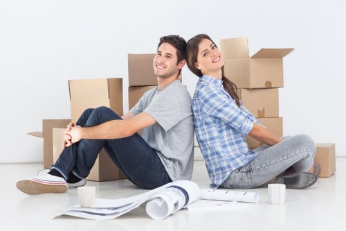 Professional movers loading items during a West Kensington relocation