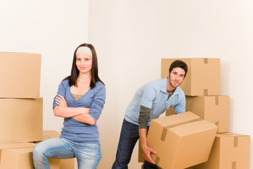 Packed office furniture and equipment ready for a business move