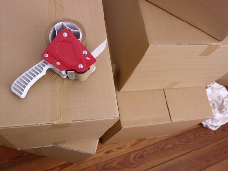 Professional packing materials and household items prepared for removals
