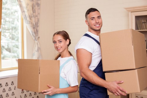 Boxes and household items prepared for a man with van service