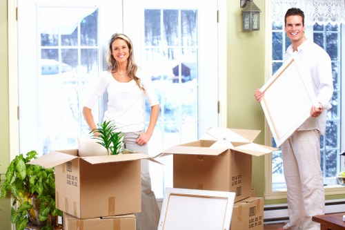 Careful loading of furniture for a West Kensington man and van job