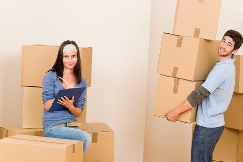Local furniture collection team handling bulky items in West Kensington